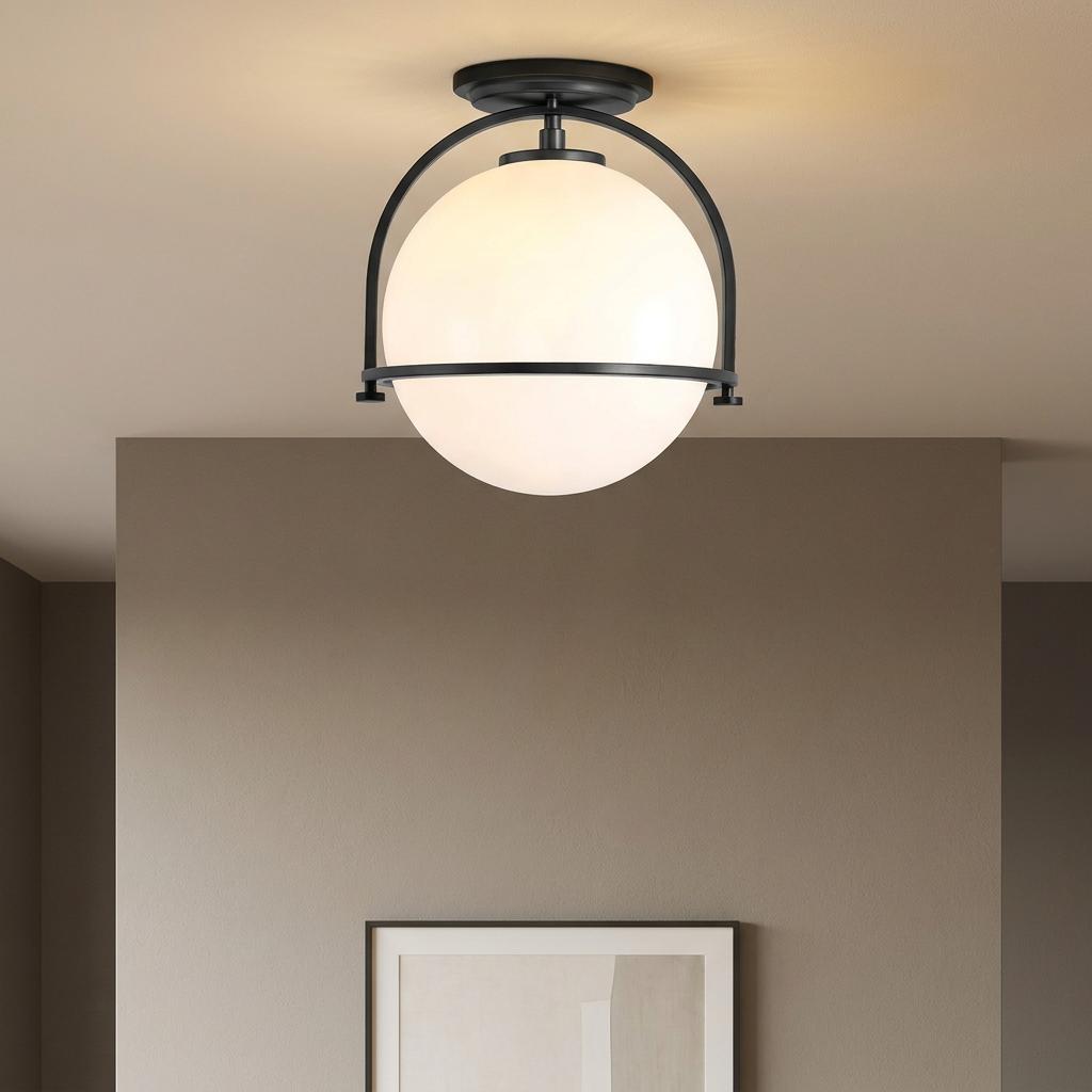 Somerset 1 light black flush ceiling light with a white globe shade and minimalist arched metal frame.