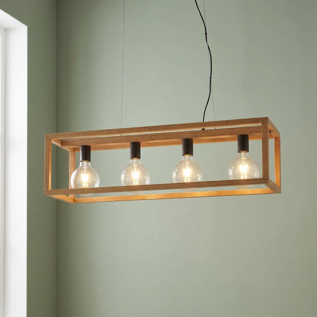 Four-light rectangular bamboo wood pendant fixture with exposed globe bulbs hanging against a sage green wall.