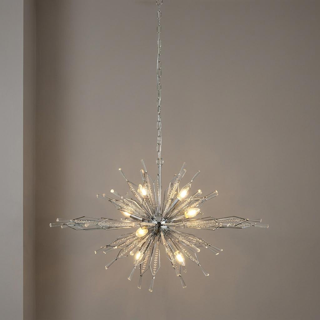 Starburst 8-light ceiling pendant with chrome finish and crystal glass accents lit against a neutral wall.