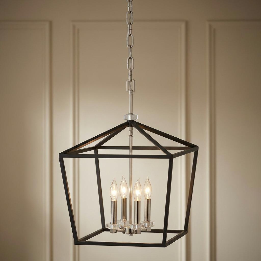 Stinson 4-light lantern pendant with a black open frame and silver candle bulbs against a paneled wall.