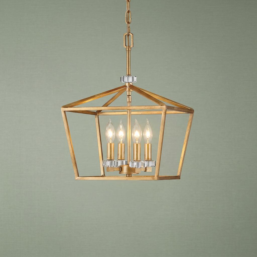 4-light brass lantern pendant with an open geometric frame and crystal accents against a green background.
