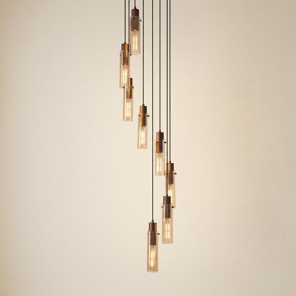 Sweden II 8-light multi-drop pendant with mocha metal and amber glass shades in a cascading spiral.