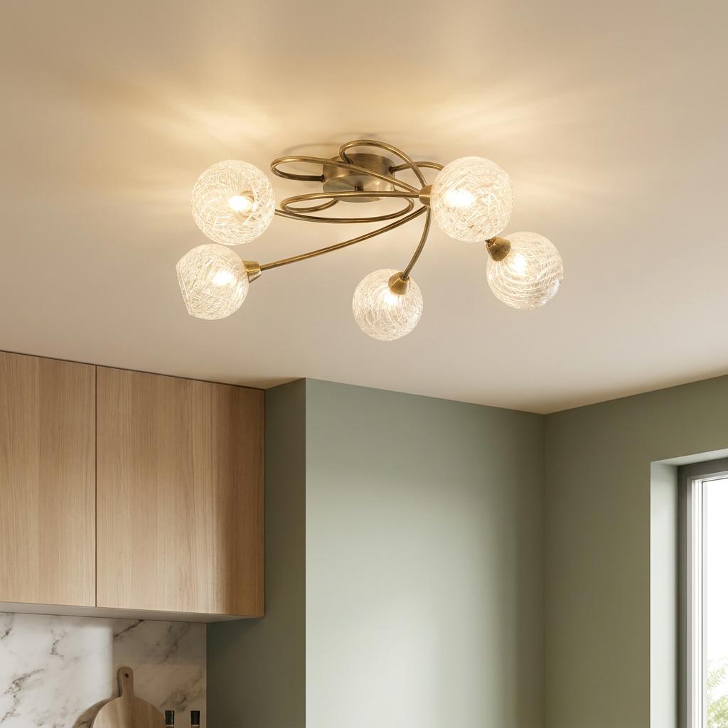 Tarn 5 light antique brass flush ceiling fixture with five textured glass globes in a contemporary kitchen.