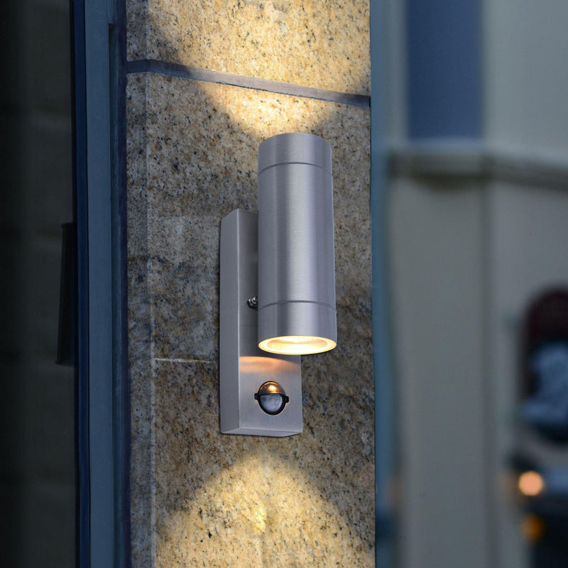 Lutec Rado PIR Outdoor Silver Wall Light In Stainless Steel 5510809001 fixed to an outside wall