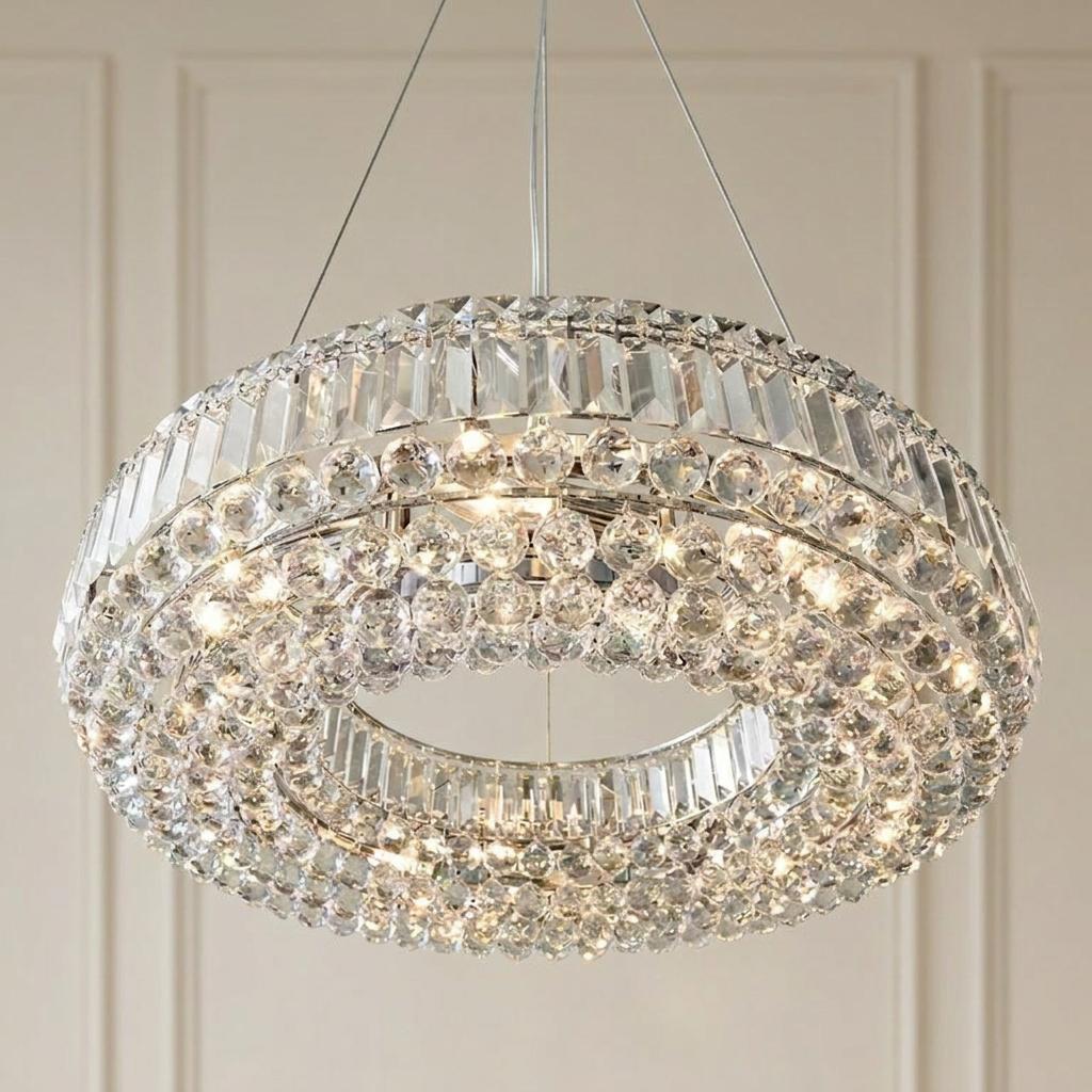 Vesuvius circular ceiling pendant with chrome finish and layers of sparkling crystal spheres and rectangular prisms.