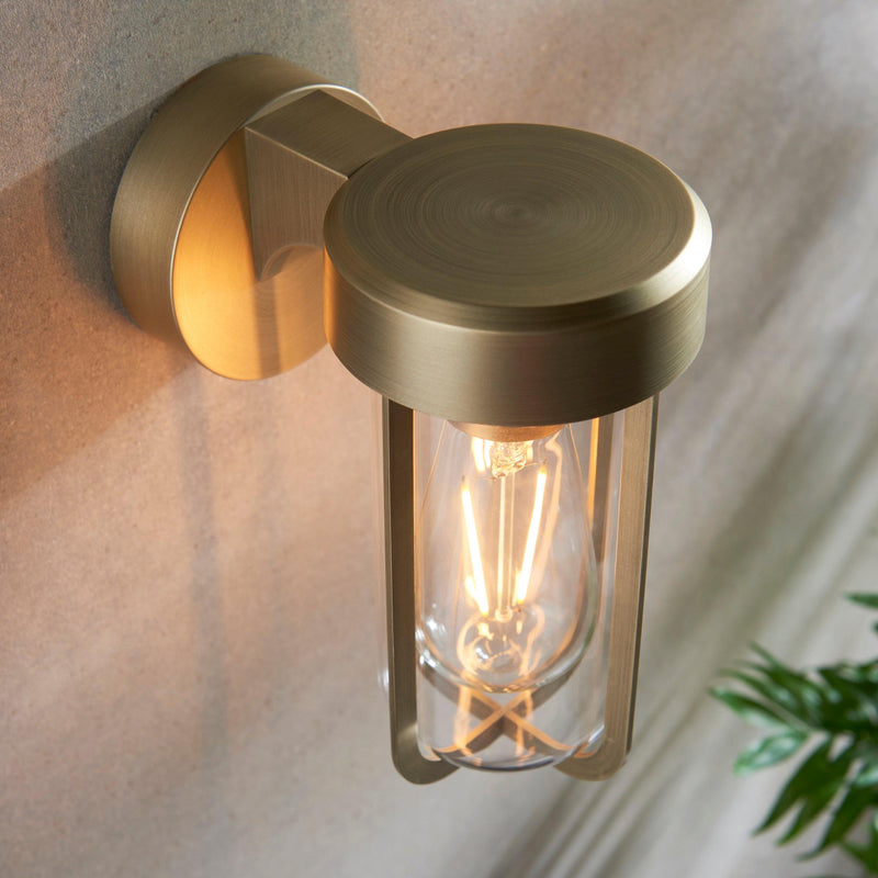 Newquay Brushed Gold Outdoor Wall Light - Glass Shade Bedroom Image