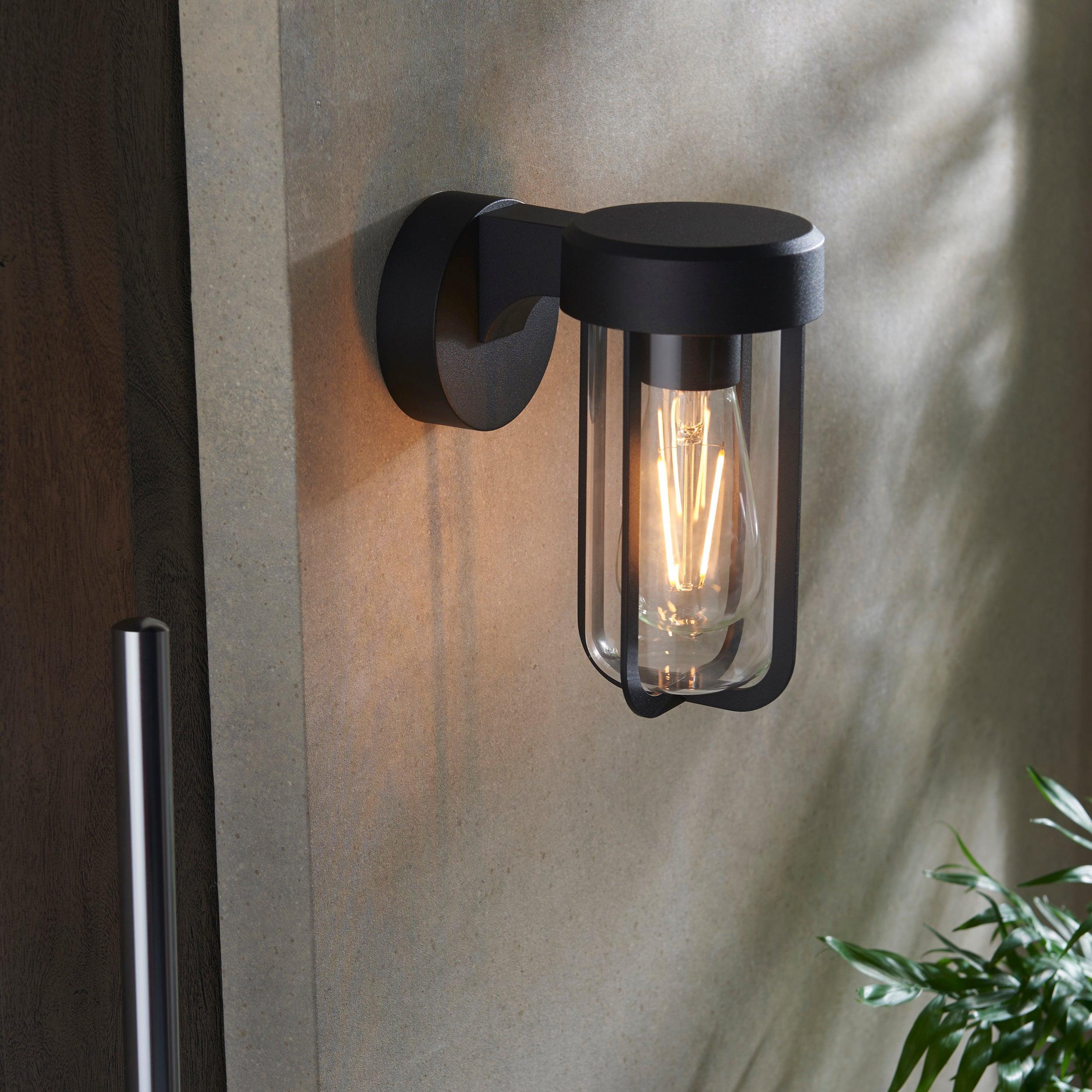newquay black outdoor wall light with clear glass shade 