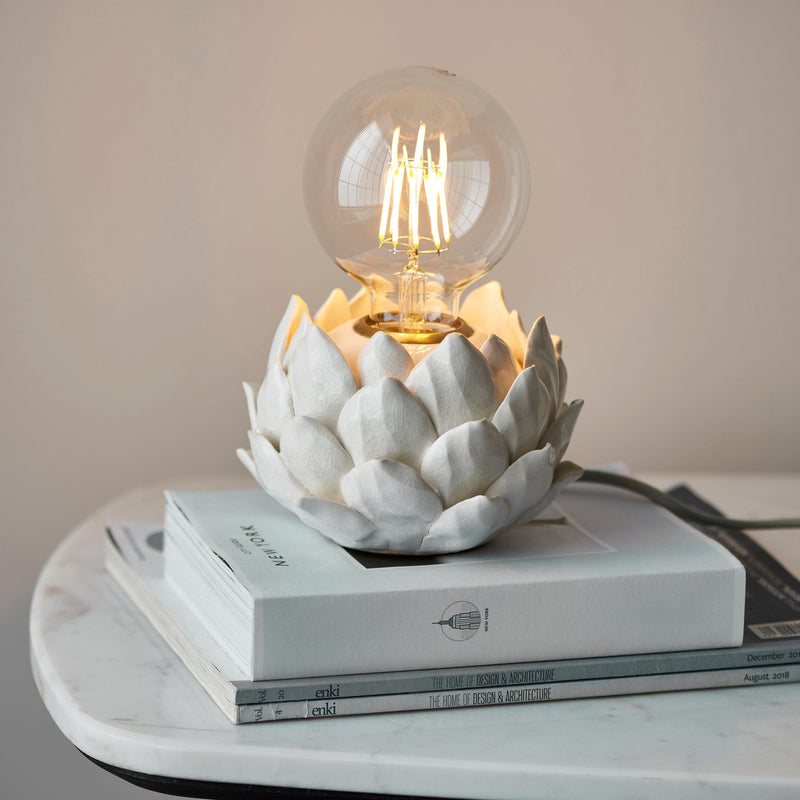 Artichoke 1 Light Beige Ceramic Table Lamp close up with lit bulb