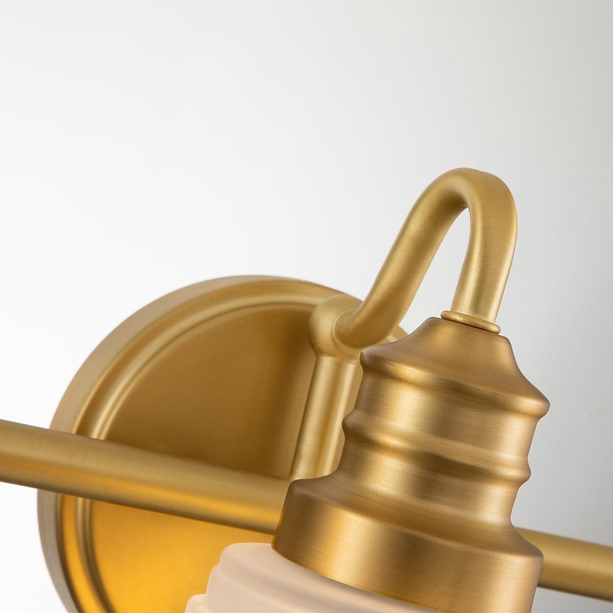 Quoizel Swell 3 Light Brass Bathroom Wall Light Close Up Image